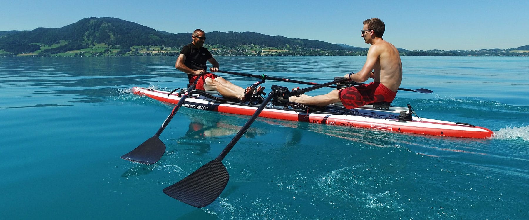 https://redbeardsailing.com/cdn/shop/t/97/assets/row-on-air-dude-18-rowing-board-young-men-tandem-rowing-feature-benefit-video-hero_1800x.progressive.jpg?v=181636134084117705181643663451